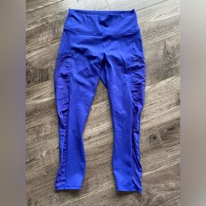 Fabletics Powerhold Royal Blue Cropped Leggings w/ mesh side cutout and pockets